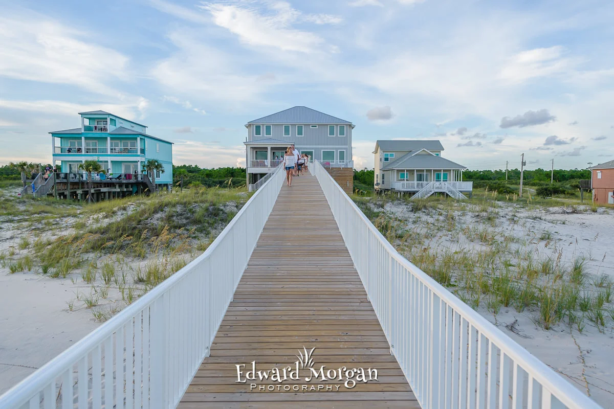 A beach house walkway leading to the beach in Fort Morgan, Alabama.