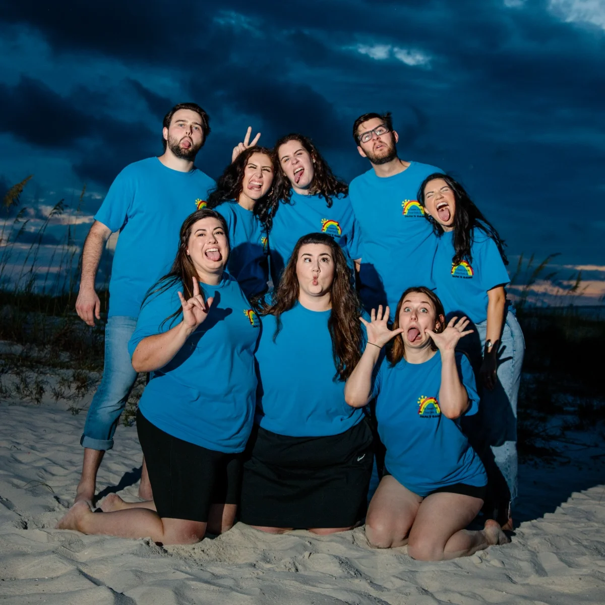 A family photo session in Fort Morgan, Alabama. Having fun making crazy faces right after sunset in Fort Morgan, Alabama.