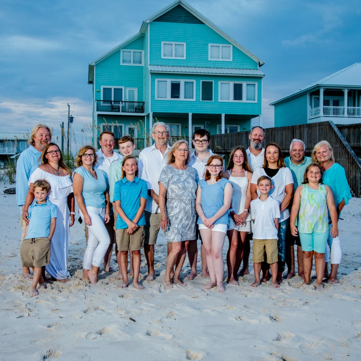 A large group family reunion photo of a family having their photos taken during a photo session in Fort Morgan, Alabama.